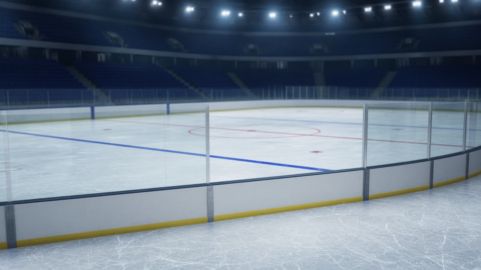 Tom ishockeyrink i arena under stark belysning — atmosfär inför SDHL